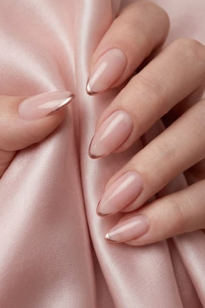 Soft nude pink graduation nails.