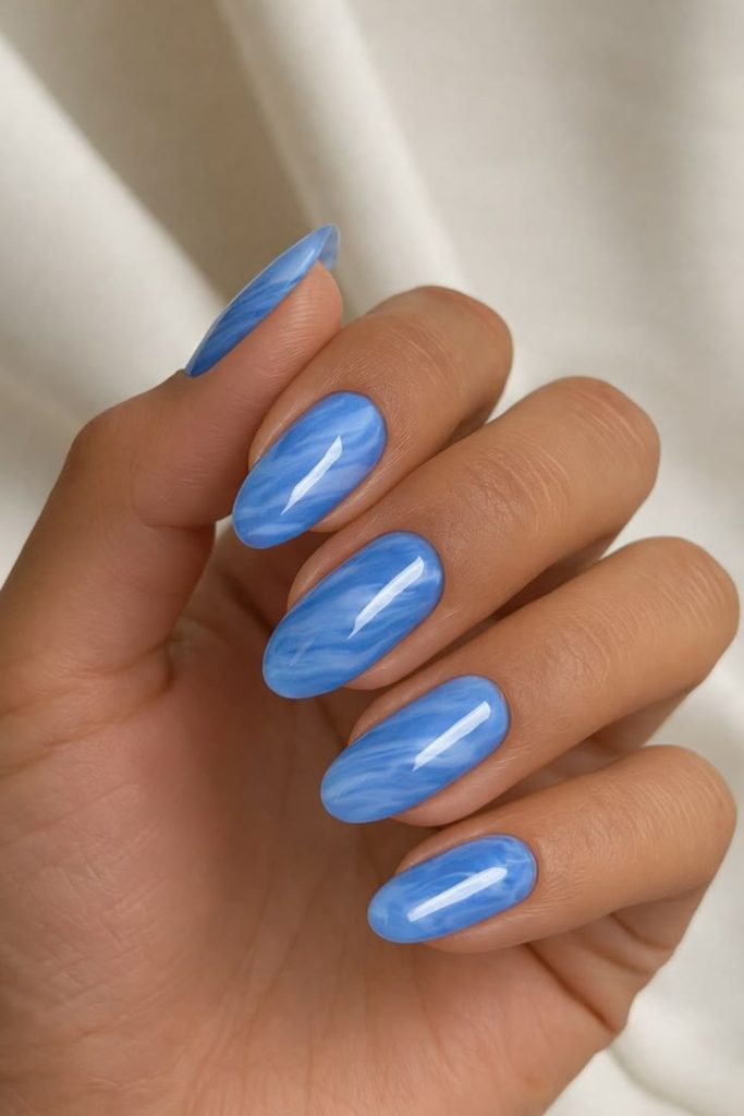 Blueberry creamy swirl nail design