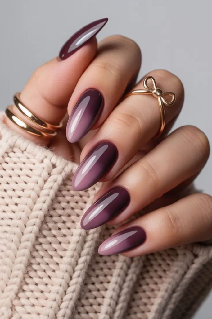 Blush smoky glossy almond nails.