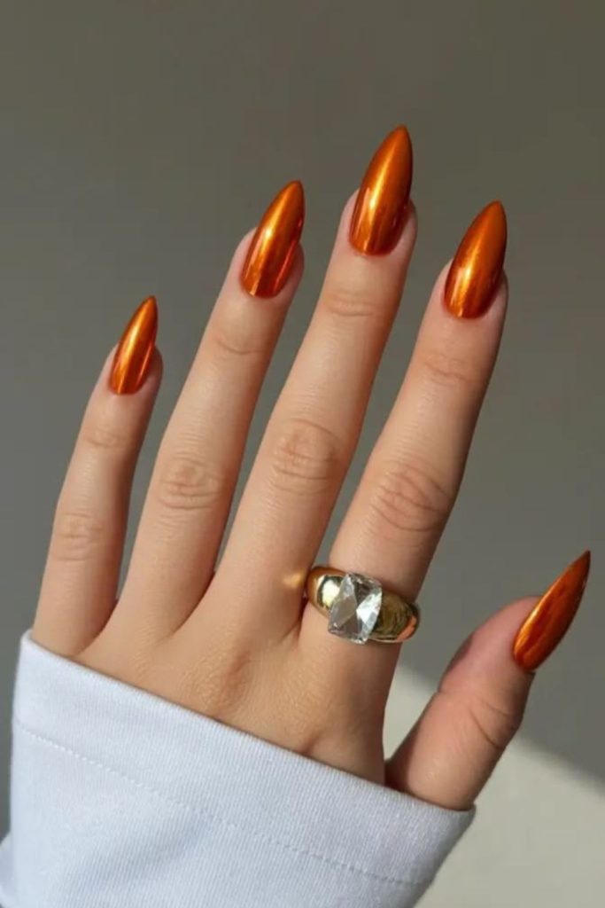 Cosmic peach chrome nail finish
