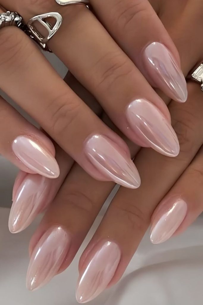 Milky pink glossy luxe nails.