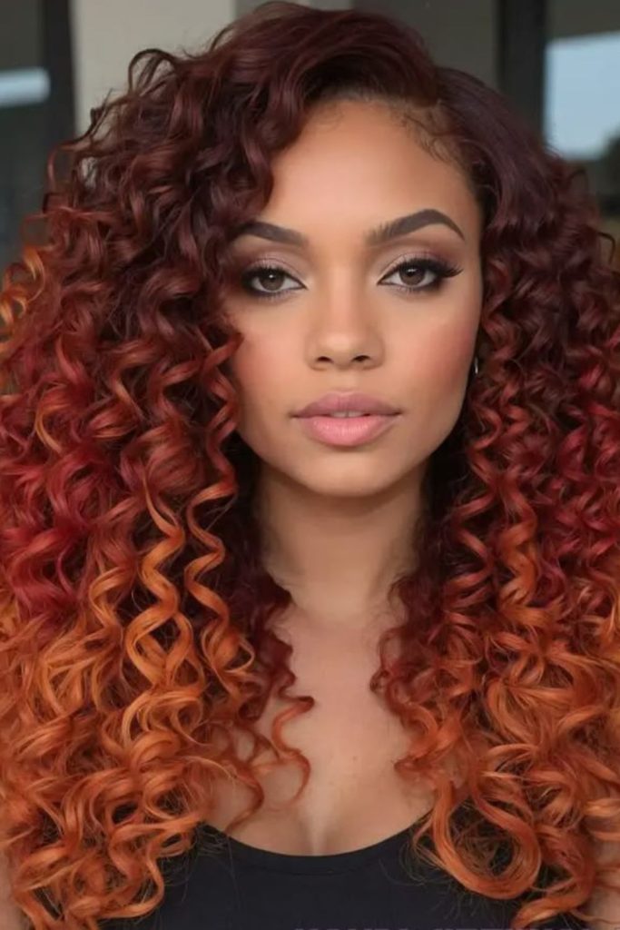 Copper glow curls vibrant warm textured hairstyle