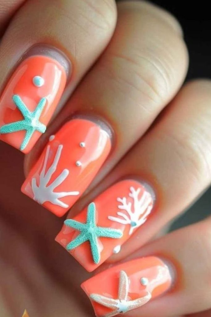Coral starfish ocean sparkle nails