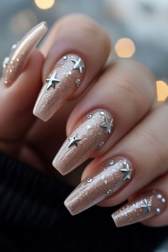 Nude glitter dust glam nails.