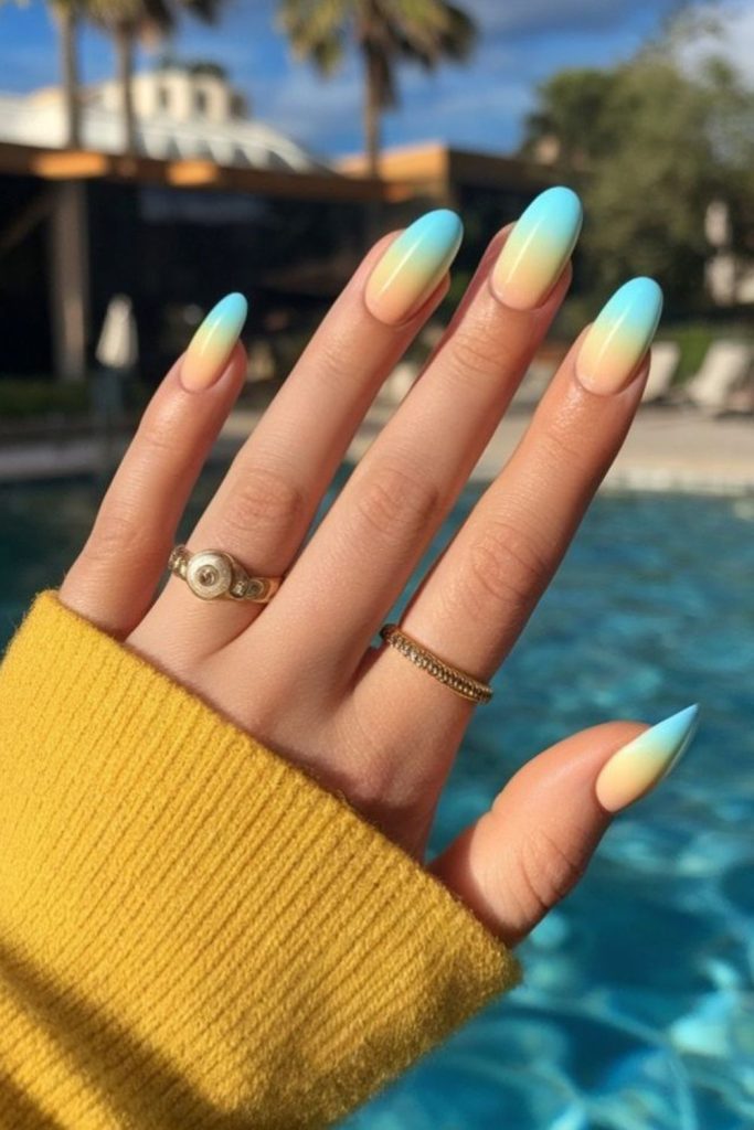 Blue to yellow gradient fade nail art.