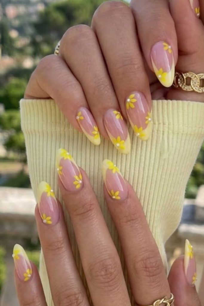 Neon lemon outline nails with bold negative space modern street style design.