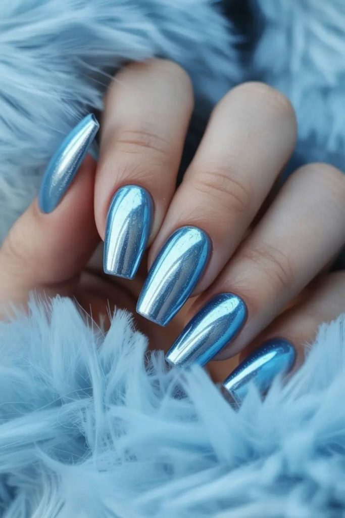 Icy blue chrome shimmer nails.