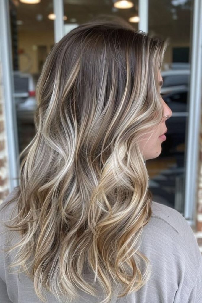 Frosted blonde highlights through hazel brown.