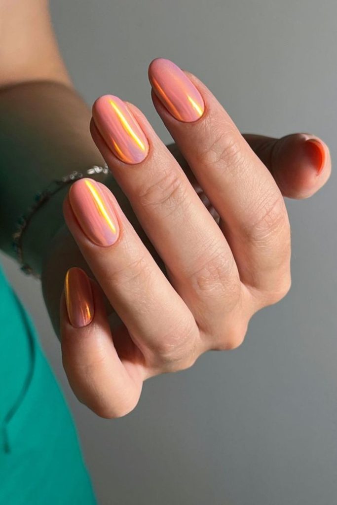 golden eclipse peach chrome nails