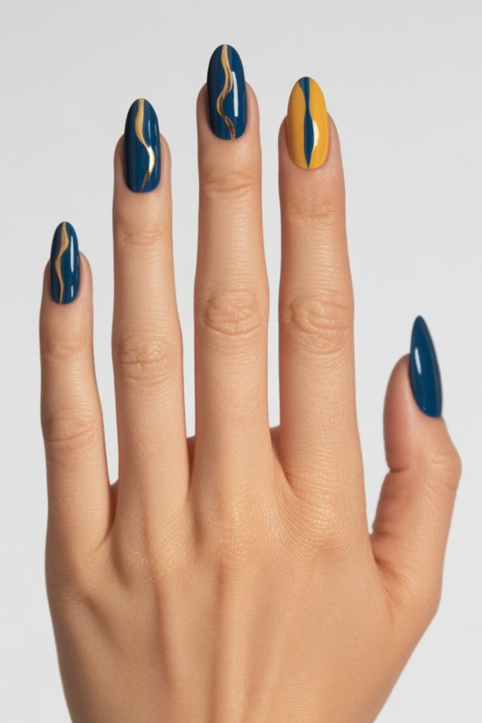 Indigo nails with sharp yellow streaks.