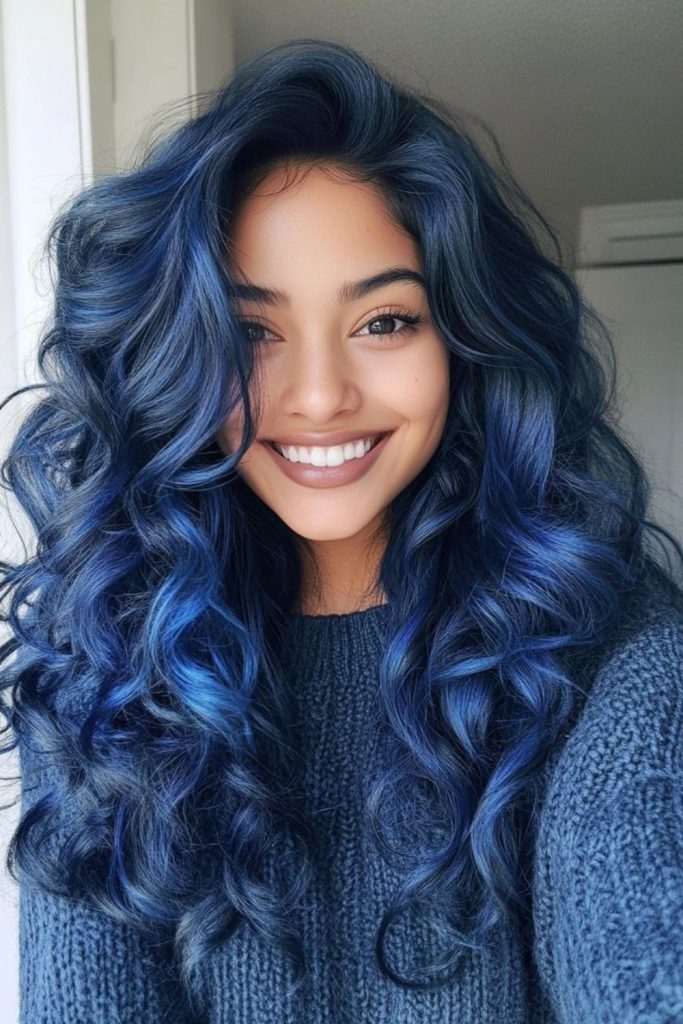 Indigo stormy curls dropping with bold textured motion