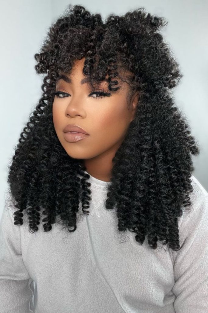 Kinky crochet curls bold voluminous texture.
