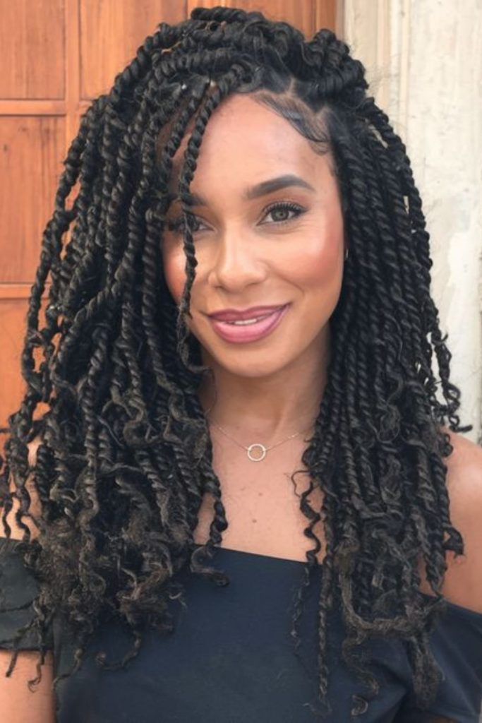 Layered crochet twists cascading back style.