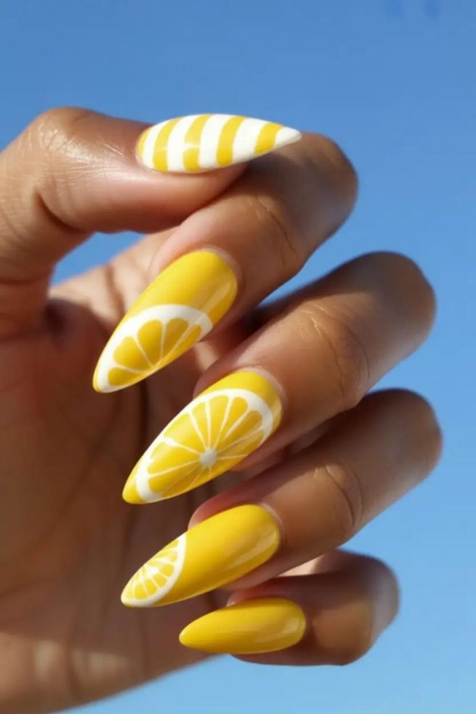 Block style lemon nails with sharp geometric modern citrus bold structured design.