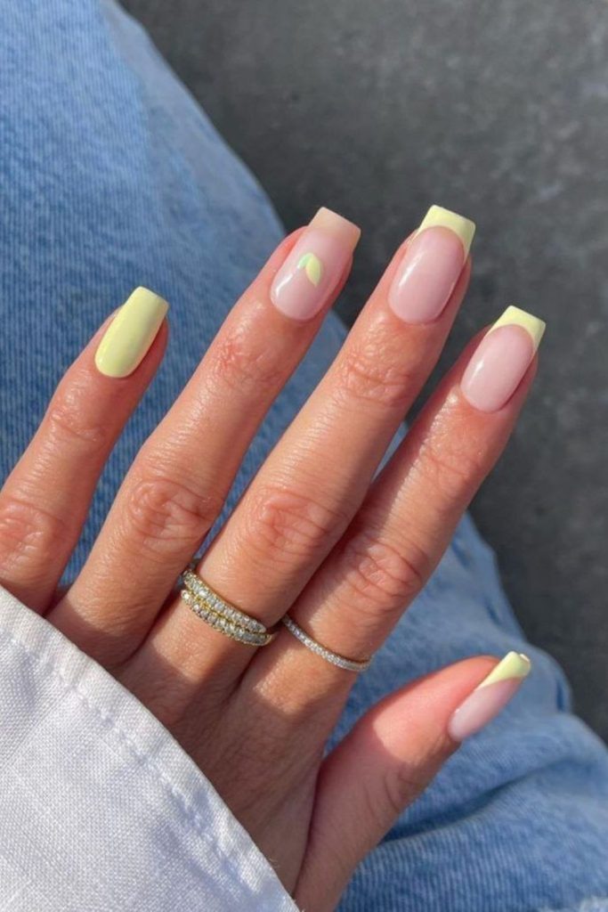 French tip lemon nails with bright yellow glow modern classy manicure twist.