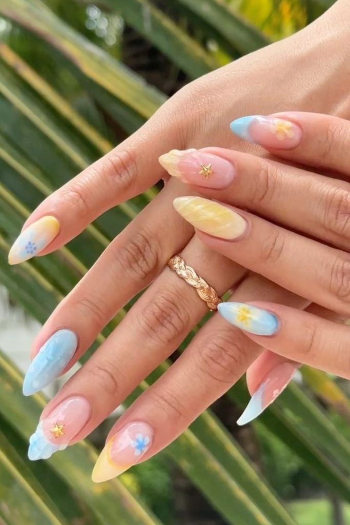 Ocean breeze lemon nails with soft blue citrus coastal fresh airy design.