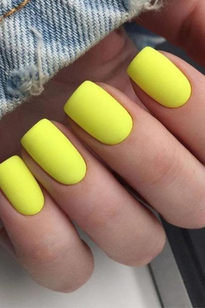 Matte neon lemon almond nails