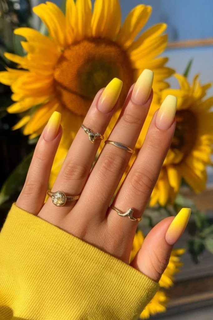 Lemon sunset fade nails with warm orange blend glowing horizon inspired manicure.
