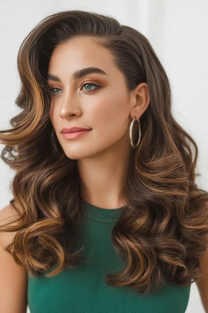 Luxury layered swoop hairstyle with silky smooth glamorous cascading flow