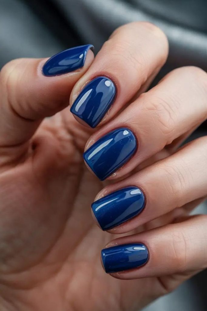 Midnight blue cosmic square nail look