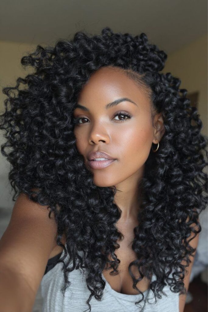 Dark dense crochet coil cascade look.