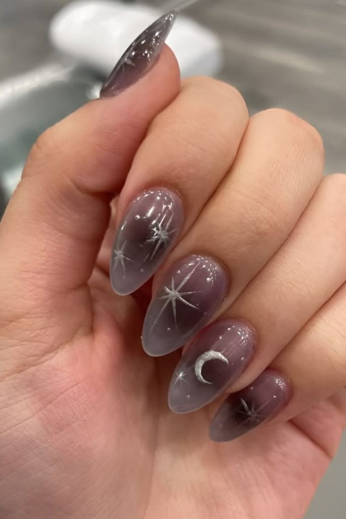 Ash grey glowing lunar nails design