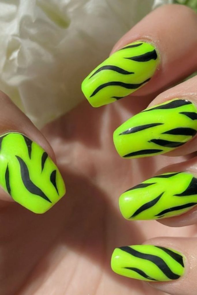 Safari stripe neon nail design