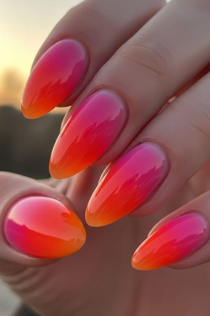Neon orange chrome nails style