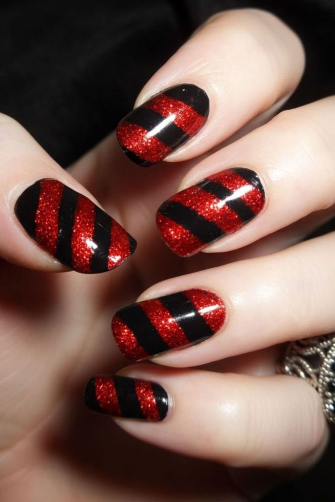 Obsidian bloodline stripes edgy manicure look