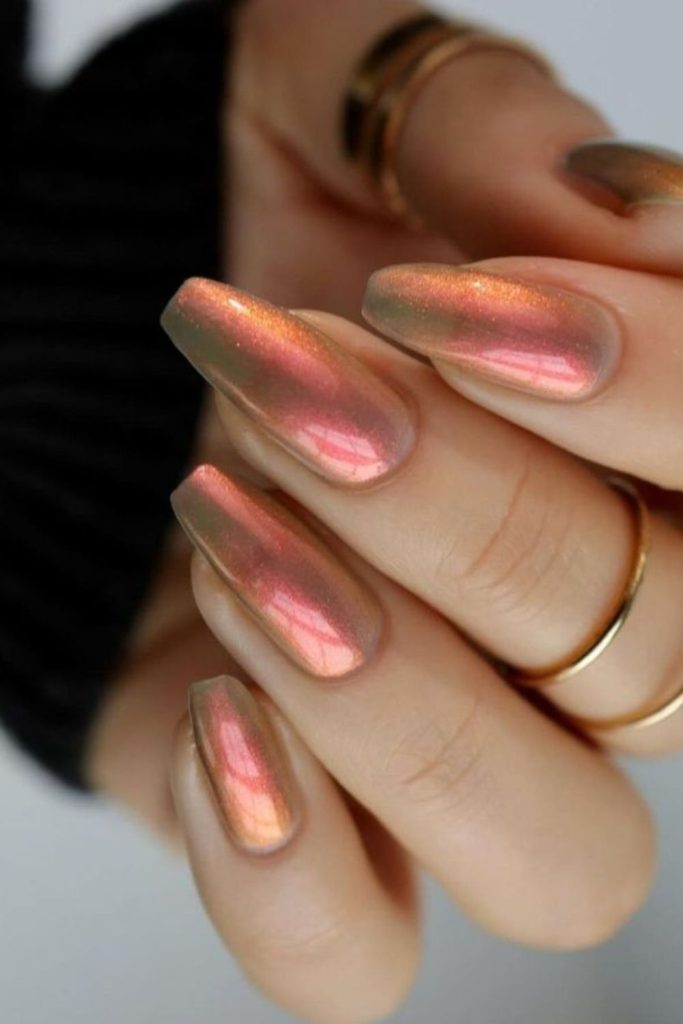Soft peach glass chrome nails