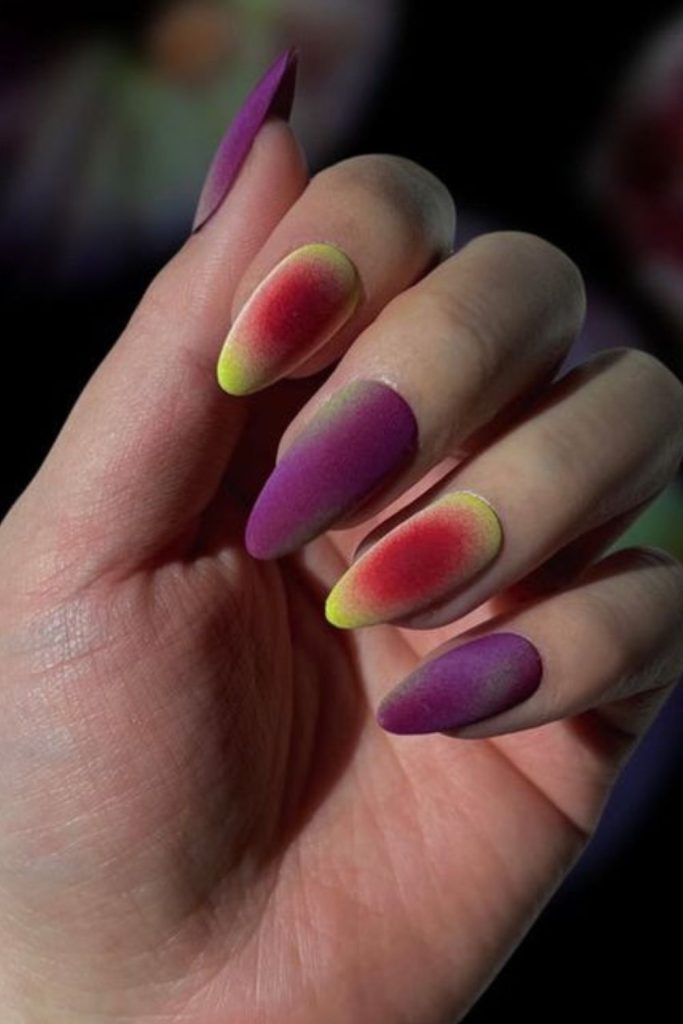 Deep plum inspired glossy nails.