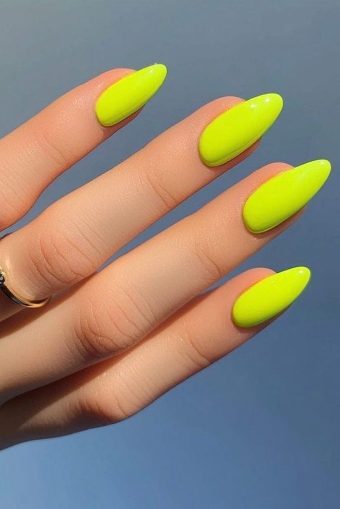 Radioactive glow bright almond nails