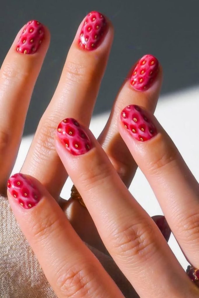Raspberry themed soft pink nails.