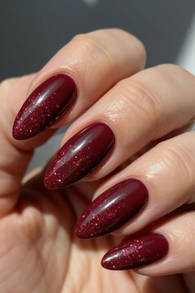 Ruby red graduation nails shimmer.