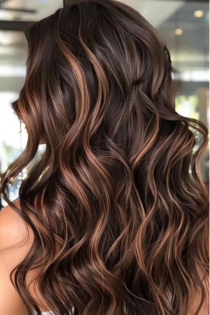 Rustic cocoa highlighted brunette layers.