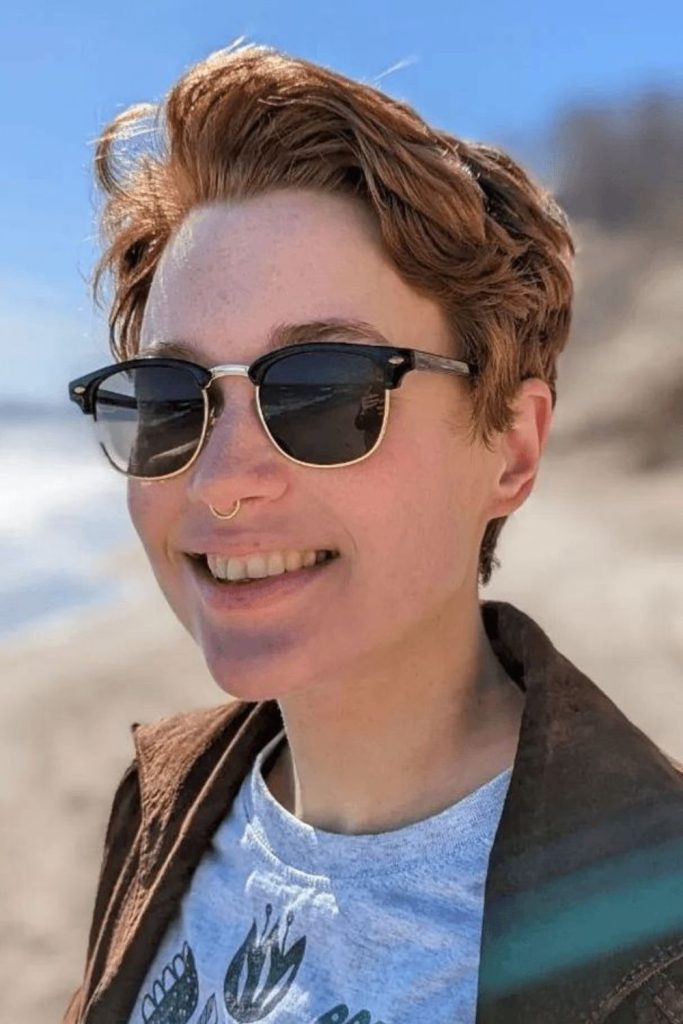 Edgy slick undercut pixie cut