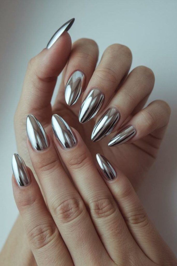 Chrome silver graduation nails with crystals.