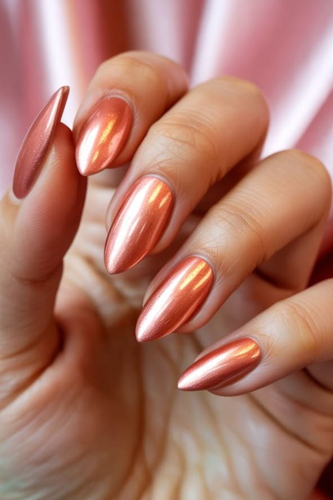 Glowing apricot sunset chrome nails