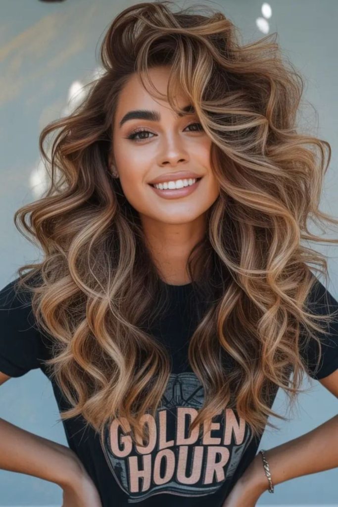 Voluminous curls glowing sunset look