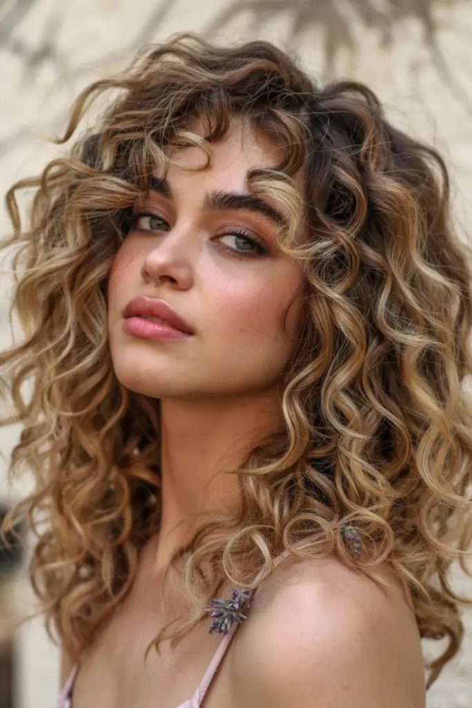 Warm sunset glowing spiral curls.