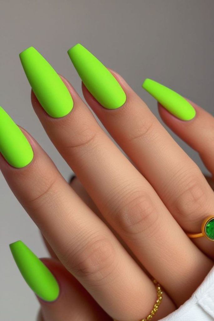 Bright lime green coffin nails.