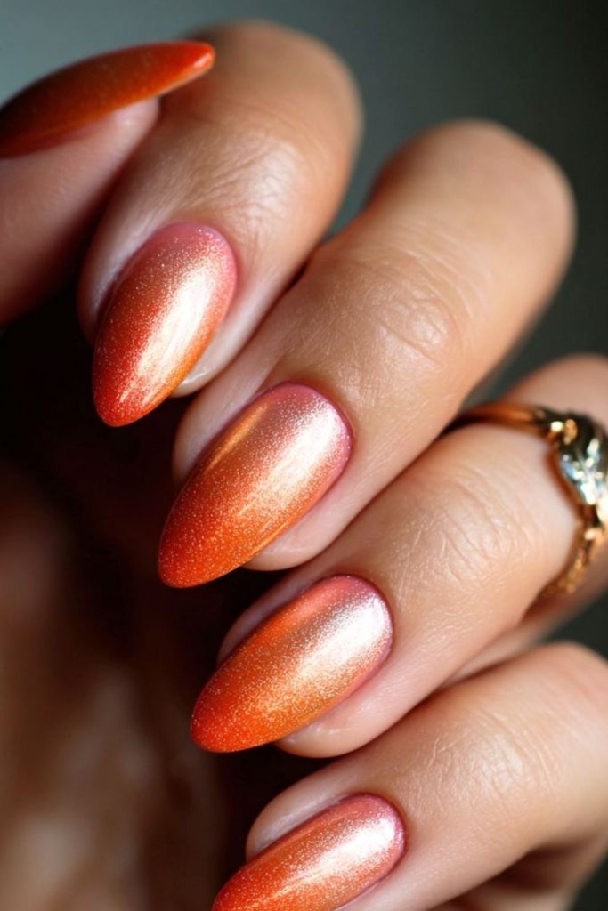 Soft pink golden chrome nails