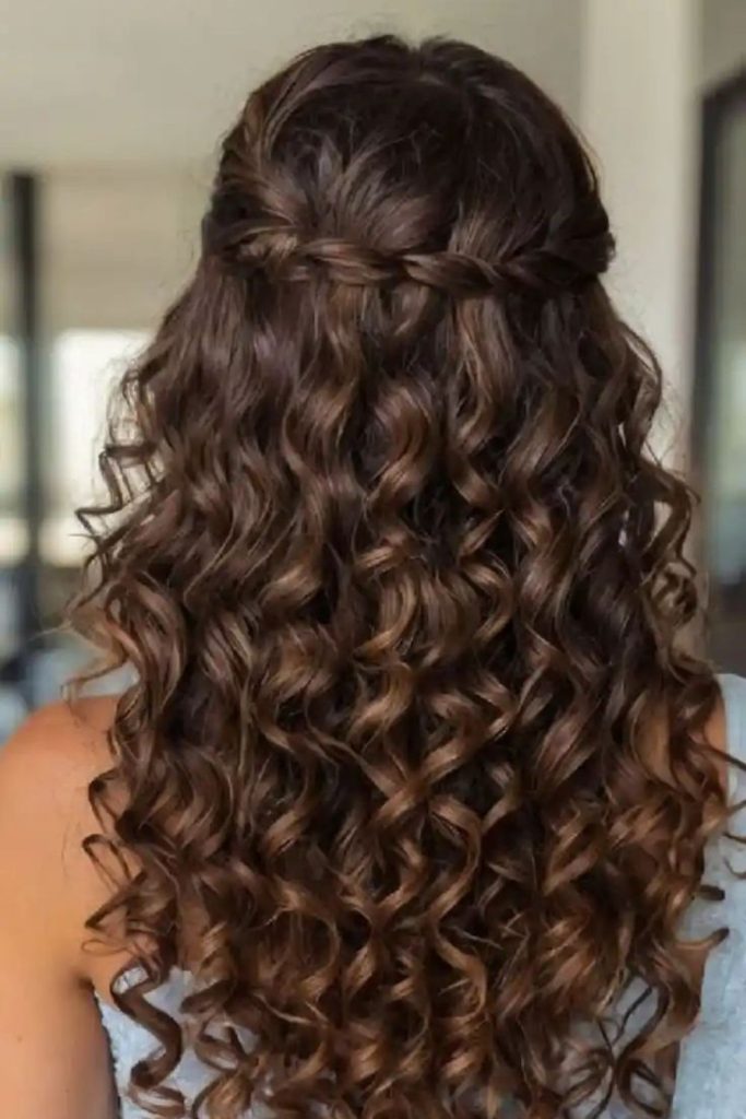 Romantic twisted curly formal hairstyle.