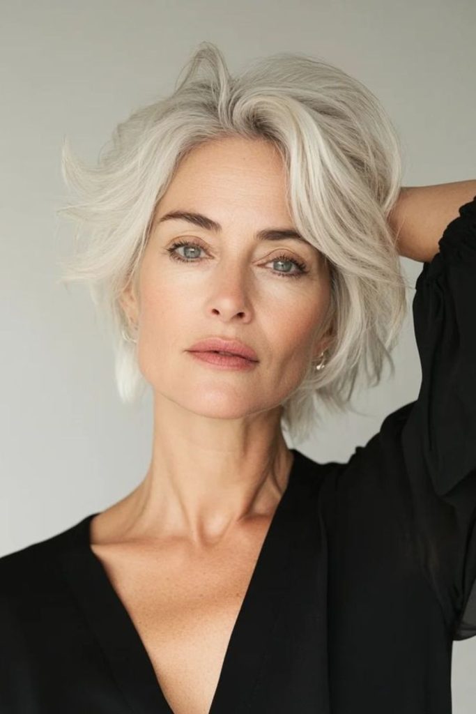 Feathered bob haircut with airy movement.