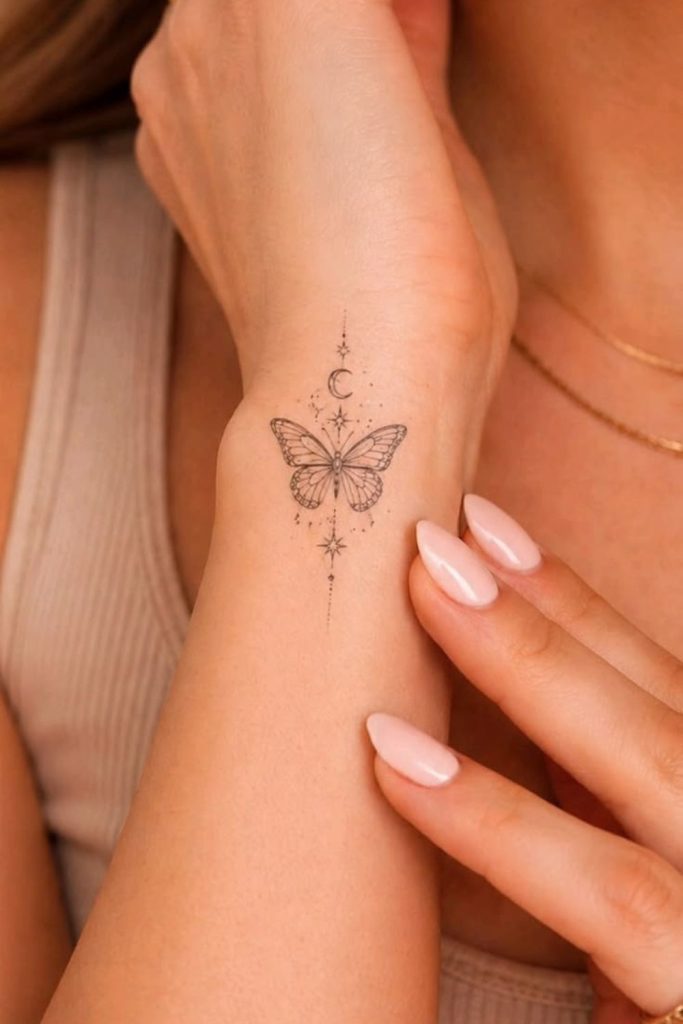 Delicate butterfly tattoo with fine wings.