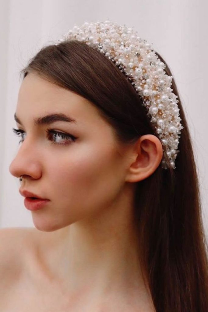 Crystal headband with flowing hairstyle.