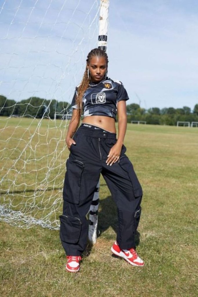 Bold football jersey cargo pants outfit