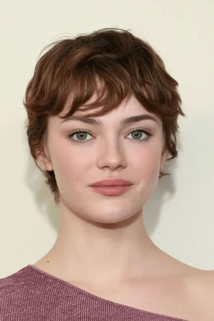 Layered crop haircut with crown lift.