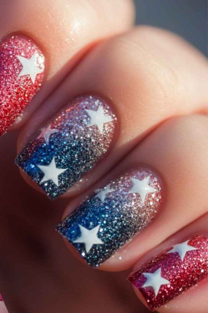 Firecracker stardust glam holiday nails.