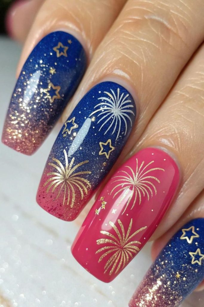 Firework galaxy inspired star nails.